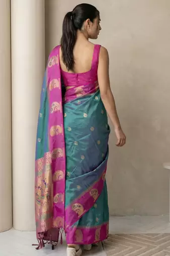 Green gold paisley zari motifs rich silk blend fabric elegant festive & wedding wear contrast border