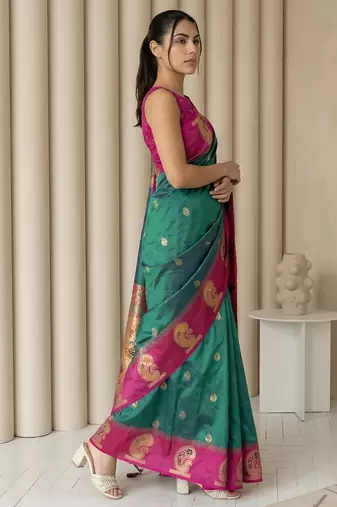Green gold paisley zari motifs rich silk blend fabric elegant festive & wedding wear contrast border
