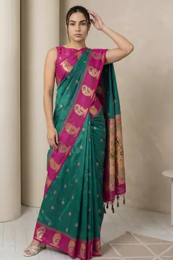 Green gold paisley zari motifs rich silk blend fabric elegant festive & wedding wear contrast border