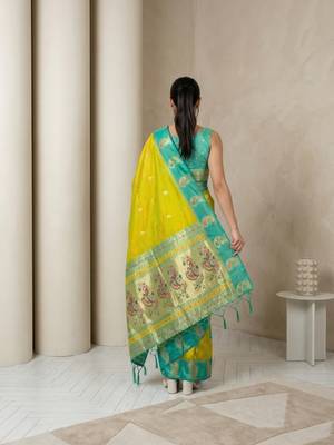 Light lime gold paisley zari motifs rich silk blend fabric elegant festive & wedding wear contrast border 2