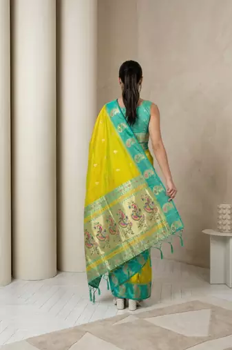 Light lime gold paisley zari motifs rich silk blend fabric elegant festive & wedding wear contrast border
