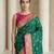 Green gold paisley zari motifs rich silk blend fabric elegant festive & wedding wear contrast border