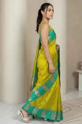 Light lime gold paisley zari motifs rich silk blend fabric elegant festive & wedding wear contrast border