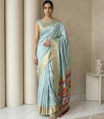 Sky blue pallu woven zari buti & traditional motifs work silk blend fabric traditional festive style