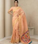 Light peach pallu woven zari buti & traditional motifs work silk blend fabric traditional festive style