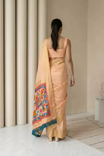 Light peach pallu woven zari buti & traditional motifs work silk blend fabric traditional festive style