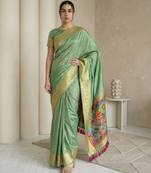 Light olive pallu woven zari buti & traditional motifs work silk blend fabric traditional festive style