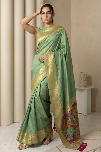 Light olive pallu woven zari buti & traditional motifs work silk blend fabric traditional festive style