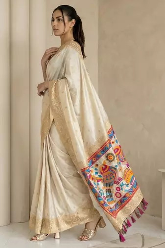 Off white pallu woven zari buti & traditional motifs work silk blend fabric traditional festive style