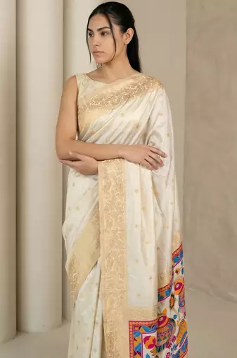 Off white pallu woven zari buti & traditional motifs work silk blend fabric traditional festive style