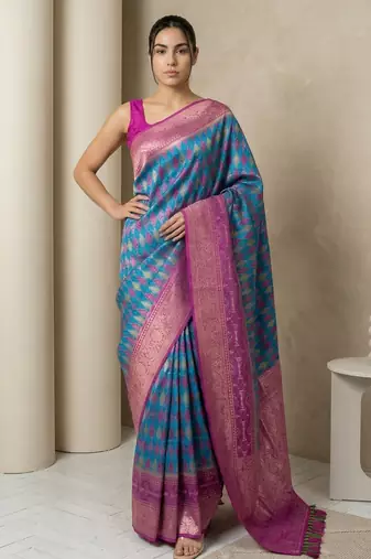 Teal geometric diamond weave pattern rich zari woven border & pallu silk blend fabric elegant festive & traditional wear