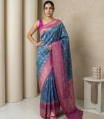 Teal geometric diamond weave pattern rich zari woven border & pallu silk blend fabric elegant festive & traditional wear