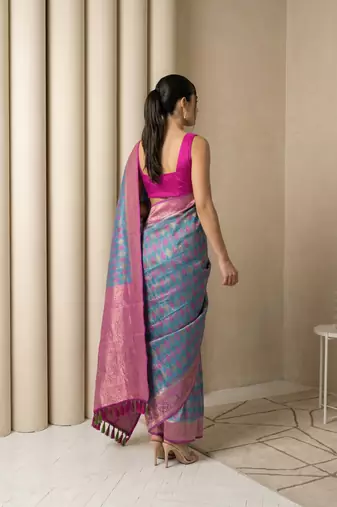 Teal geometric diamond weave pattern rich zari woven border & pallu silk blend fabric elegant festive & traditional wear