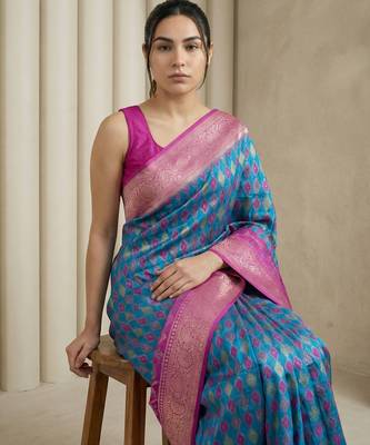 Teal geometric diamond weave pattern rich zari woven border & pallu silk blend fabric elegant festive & traditional wear 5