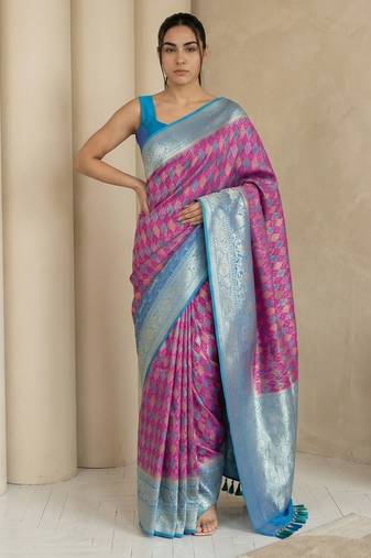 Pink geometric diamond weave pattern rich zari woven border & pallu silk blend fabric elegant festive & traditional wear