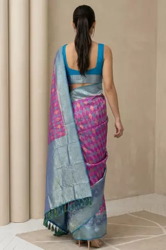 Pink geometric diamond weave pattern rich zari woven border & pallu silk blend fabric elegant festive & traditional wear