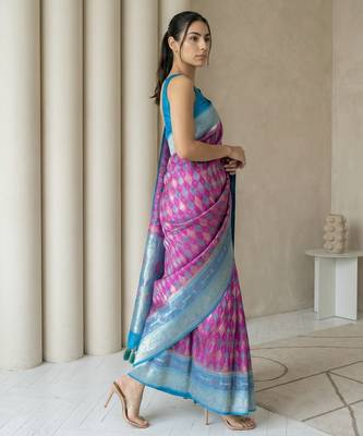 Pink geometric diamond weave pattern rich zari woven border & pallu silk blend fabric elegant festive & traditional wear 3