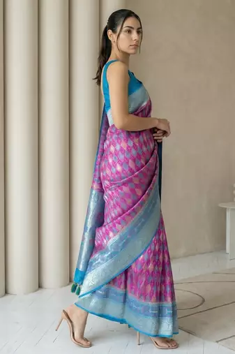 Pink geometric diamond weave pattern rich zari woven border & pallu silk blend fabric elegant festive & traditional wear