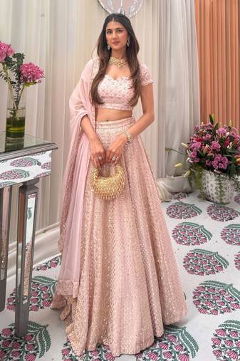 Stunning Pastel Pink Lehenga with Heavy Embroidery & Flair