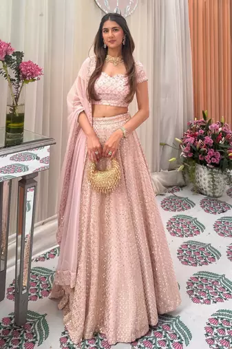 Stunning Pastel Pink Lehenga with Heavy Embroidery & Flair