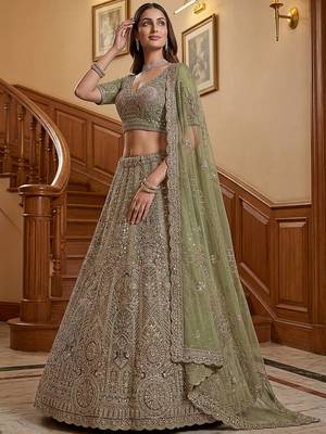 Ravishing Green Heavy Embroidered Net Evening Wear Lehenga Choli 3