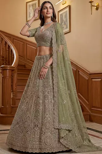 Ravishing Green Heavy Embroidered Net Evening Wear Lehenga Choli