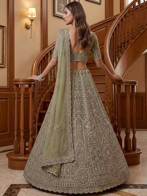 Ravishing Green Heavy Embroidered Net Evening Wear Lehenga Choli 4
