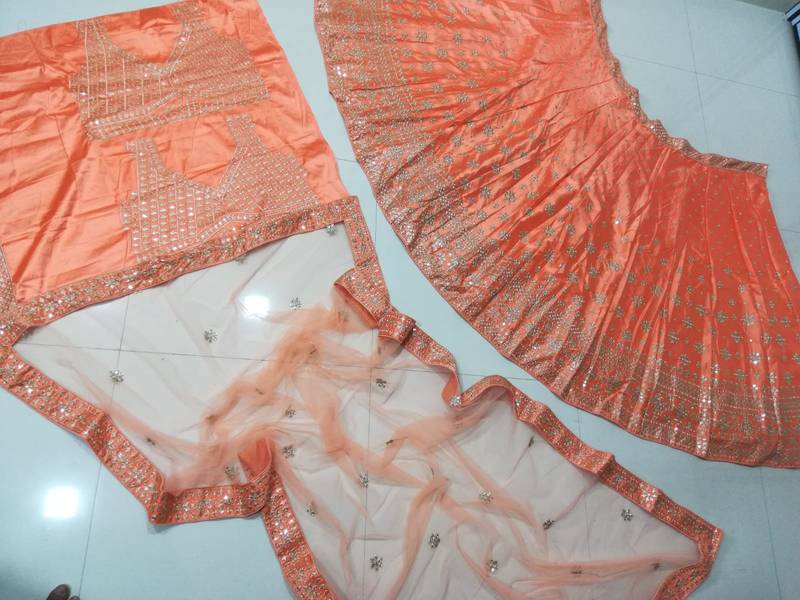 Orange Devsena Silk Sequins Zari Embroidered Lehenga Choli with Net Dupatta