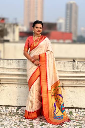 Off-white silk blend saree with orange zari border & peacock printed pallu | festive traditional wear saree