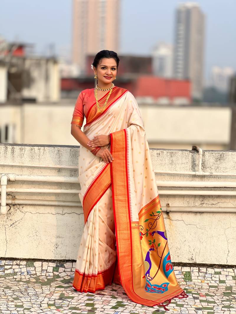Off-white silk blend saree with orange zari border & peacock printed pallu | festive traditional wear saree