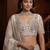 Dreamy Off-White Dori Work Net Wedding Wear Lehenga Choli