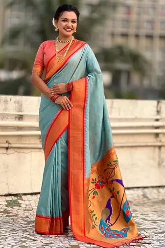Sky blue silk blend saree with orange zari border & peacock printed pallu | festive traditional wear saree