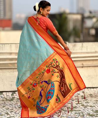 Sky blue silk blend saree with orange zari border & peacock printed pallu | festive traditional wear saree 2