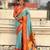 Sky blue silk blend saree with orange zari border & peacock printed pallu | festive traditional wear saree