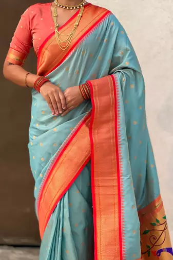 Sky blue silk blend saree with orange zari border & peacock printed pallu | festive traditional wear saree