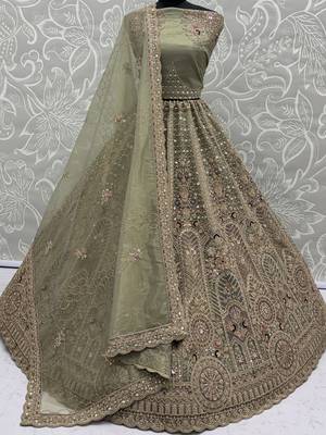 Ravishing Green Heavy Embroidered Net Evening Wear Lehenga Choli 6