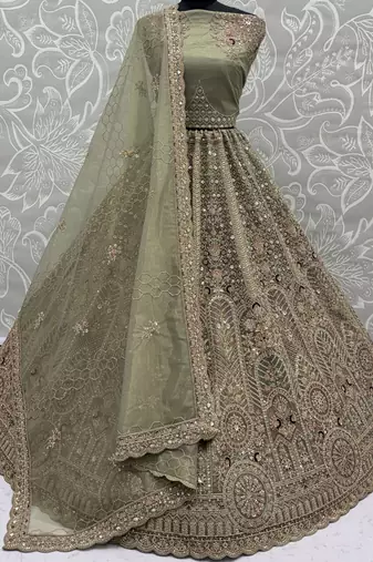 Ravishing Green Heavy Embroidered Net Evening Wear Lehenga Choli