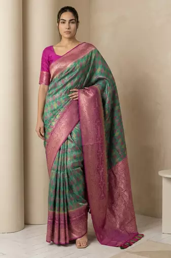 Sea green geometric diamond weave pattern rich zari woven border & pallu silk blend fabric