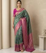 Sea green geometric diamond weave pattern rich zari woven border & pallu silk blend fabric