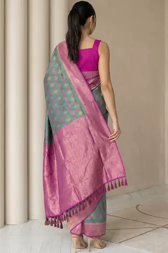 Sea green geometric diamond weave pattern rich zari woven border & pallu silk blend fabric