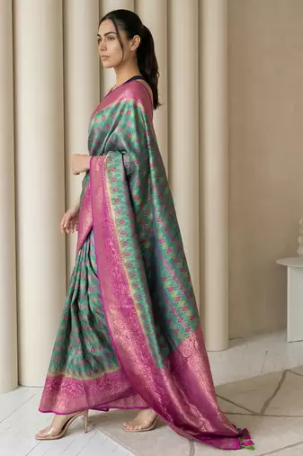 Sea green geometric diamond weave pattern rich zari woven border & pallu silk blend fabric