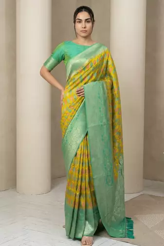 Yellow geometric diamond weave pattern rich zari woven border & pallu silk blend fabric