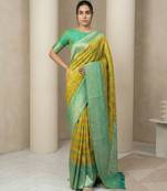 Yellow geometric diamond weave pattern rich zari woven border & pallu silk blend fabric