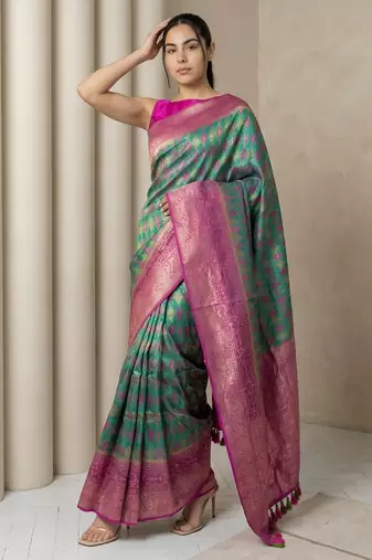 Sea green geometric diamond weave pattern rich zari woven border & pallu silk blend fabric