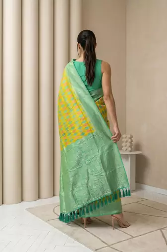 Yellow geometric diamond weave pattern rich zari woven border & pallu silk blend fabric