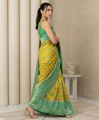 Yellow geometric diamond weave pattern rich zari woven border & pallu silk blend fabric 3