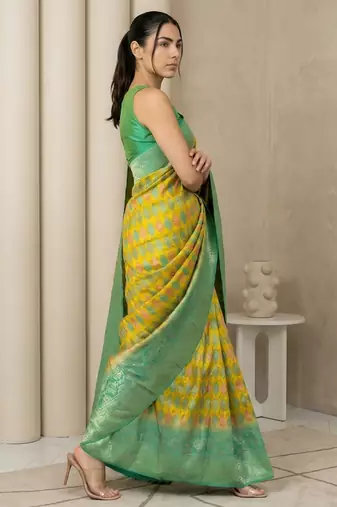 Yellow geometric diamond weave pattern rich zari woven border & pallu silk blend fabric