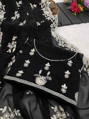 black embroidered shimmer silk saree with border work 4