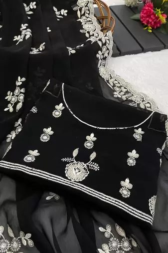 black embroidered shimmer silk saree with border work