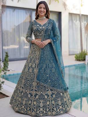 Splendid Teal Blue Sequins Net Party Wear Lehenga With Blouse 1